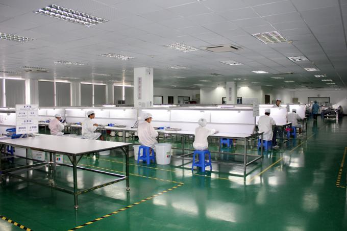 A full production line in HENGXANG's assembly workshop, where components move from workstation to workstation under organized quality-controlled conditions